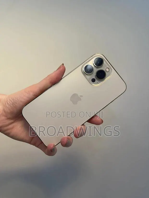 Apple iPhone 13 Pro 128 GB Gold · Photo 1