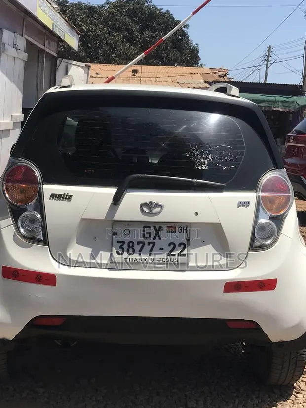 Chevrolet Spark Hatch LS 2011 White · Photo 1