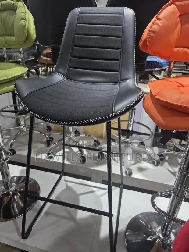 Faux Leather Counter-Height Barstool With a Cushion Seat · Photo 1