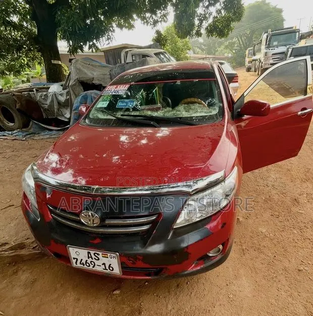 Toyota Corolla 2010 Red · Photo 1