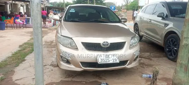 Toyota Corolla 2009 Brown · Photo 1