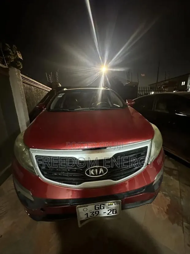Kia Sportage 2012 Red · Photo 1