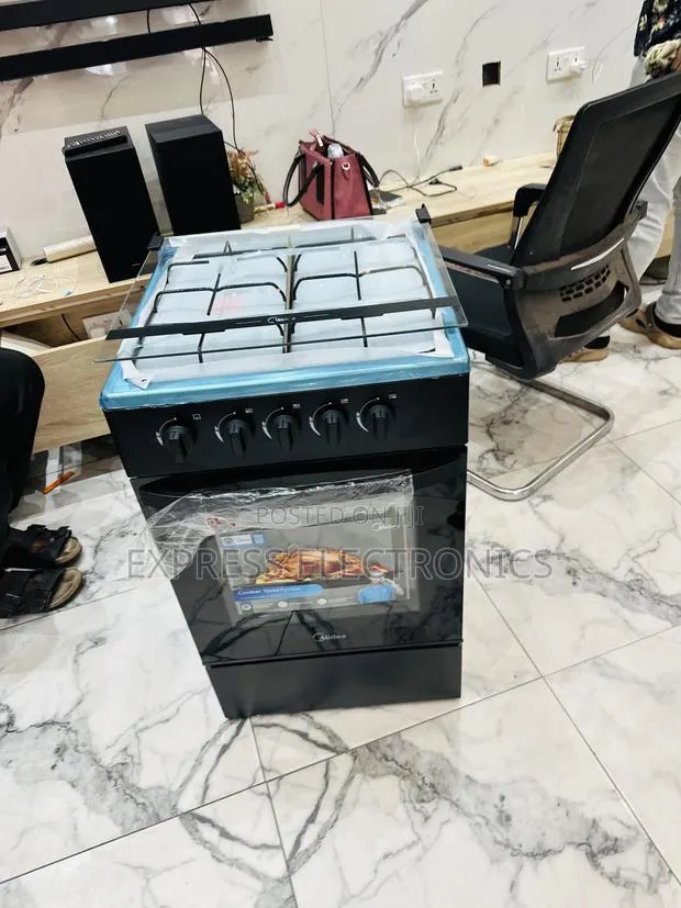 Grab the New Gas Cooker Oven 4b 50/50 Oven Midea Black · Photo 1