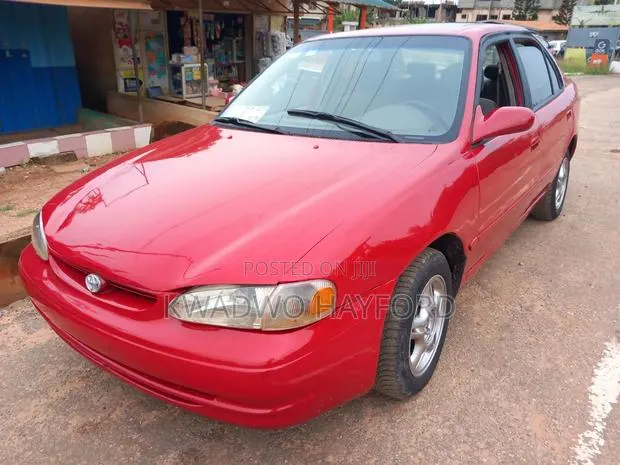 Toyota Corolla Sedan 2001 Red · Photo 4