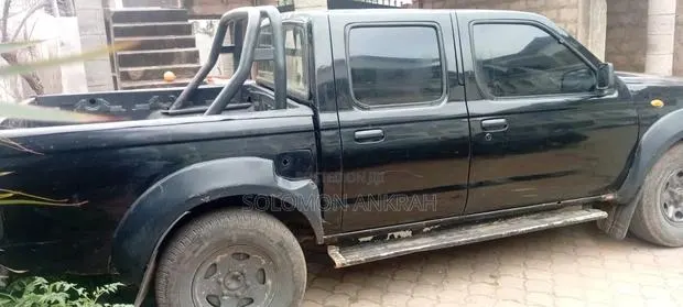 Nissan Hardbody 2010 Black · Photo 1