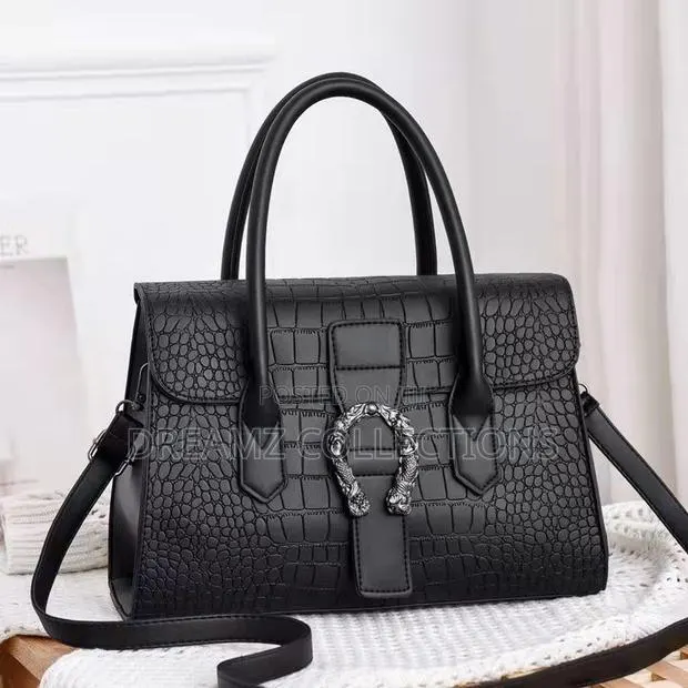 Regal Twin Buckle Handbag · Photo 1
