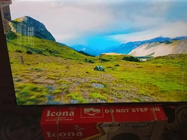 Asano 50-Inch Smart Tv – Your Home Cinema Solution · Photo 1