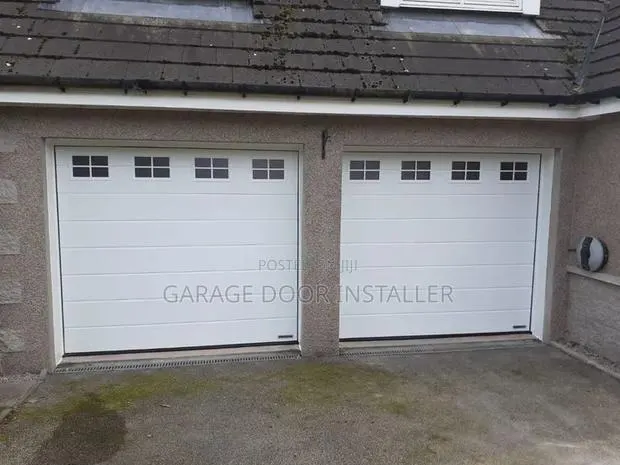 Automatic Garage Door With Windows · Photo 1