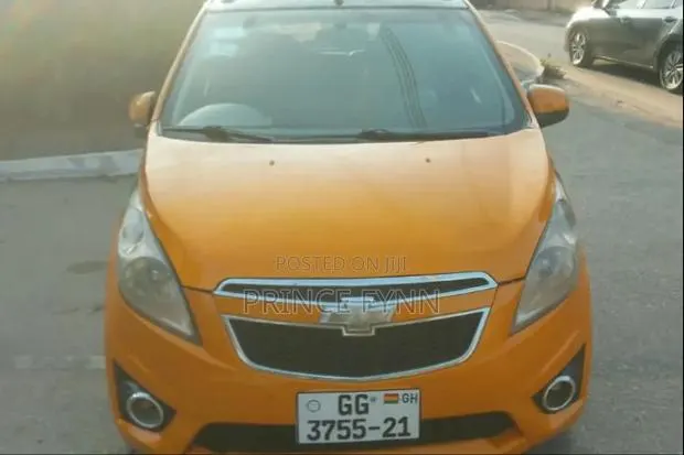 Chevrolet Spark 2012 Orange · Photo 1