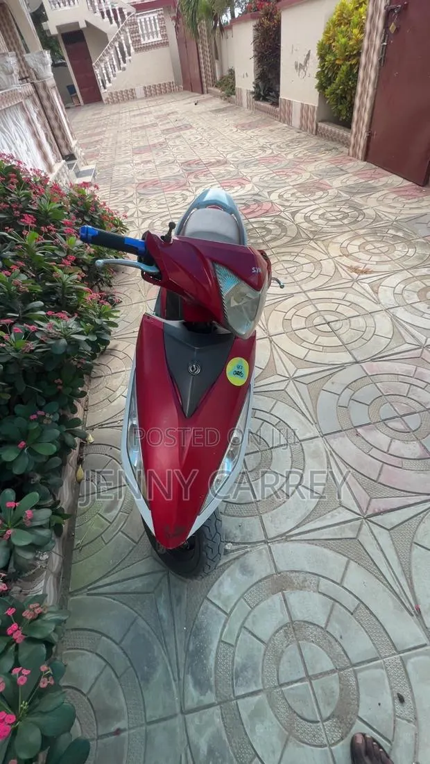 Suzuki Access 125 2009 Red · Photo 1