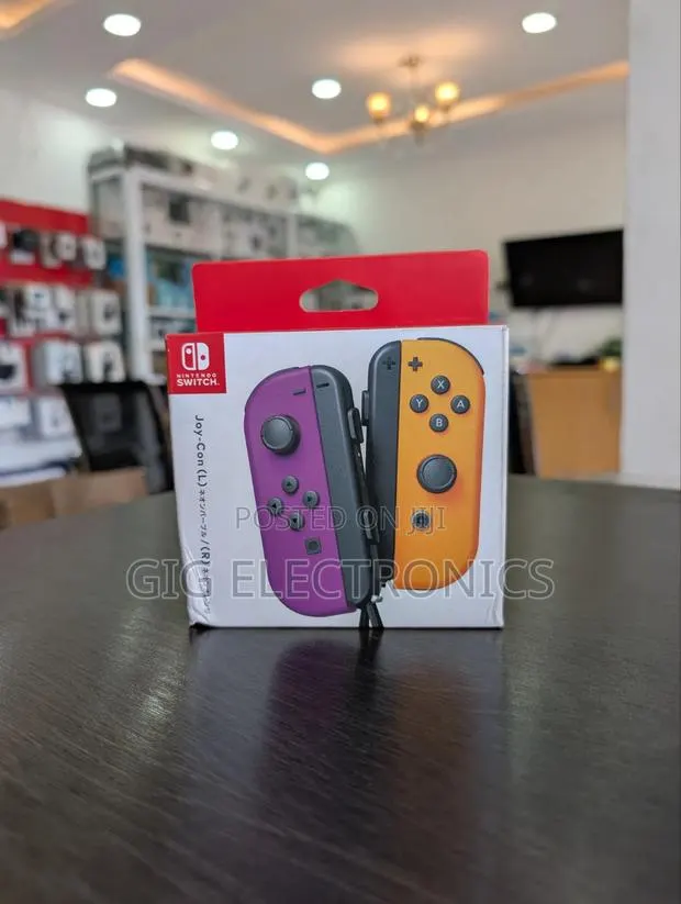 Nintendo Switch Joy-Con Neon Purple/Neon Orange(L-R) · Photo 1