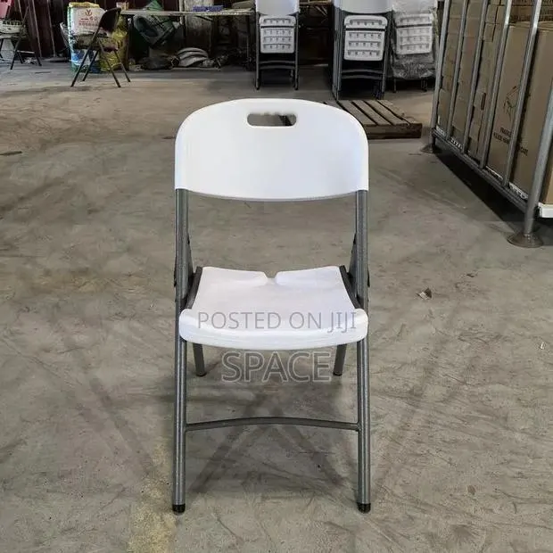 White Foldable Chair With Strong Metal Frame – New | SpaceFurniHub · Photo 1