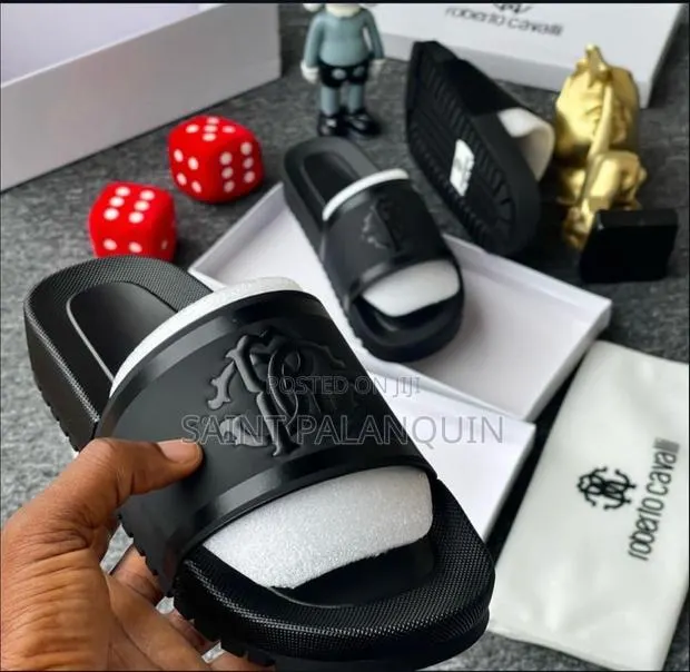 These Are Black Roberto Cavalli Slide Sandals · Photo 1