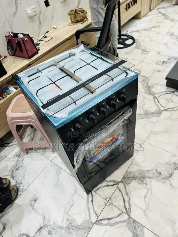 High Quality Gas Cooker Midea 4burner 50/50 Oven · Photo 1