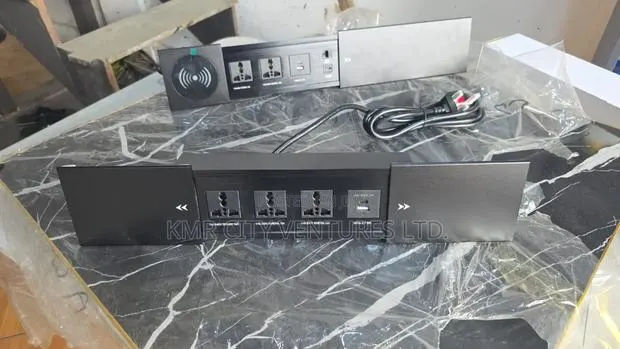 Recessed Table-Top Power Outlet · Photo 1