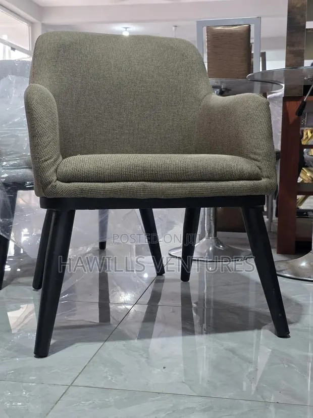 Milano Dining Chair With a Woven Fabric Sentand Black Metal Legs · Photo 1