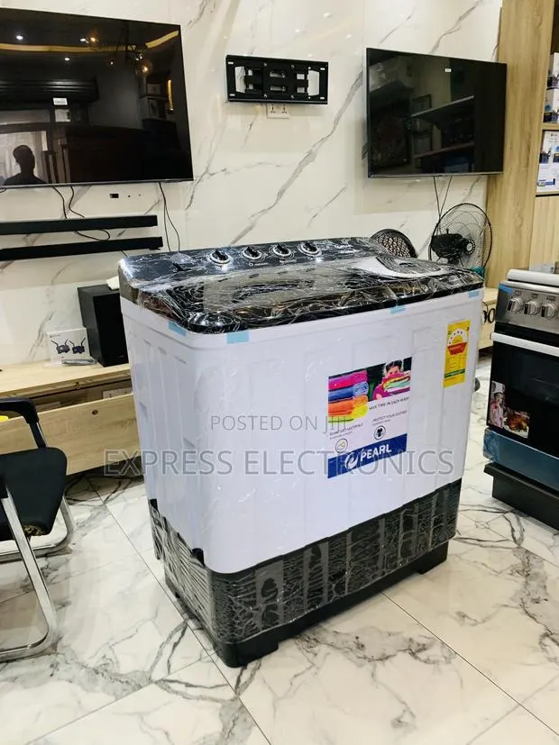 Ultra White Semi Automatic Pearl 18Kg Topload Twintub. · Photo 1