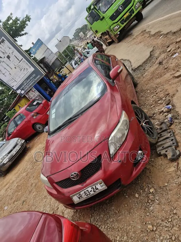 Toyota Corolla 2010 Red · Photo 1