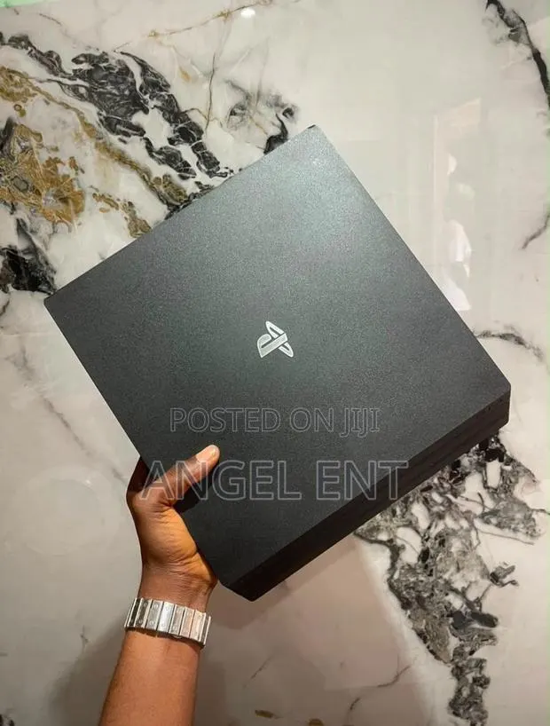 PS4 Pro With 22 Games Installed Available With One Game Pad · Photo 1
