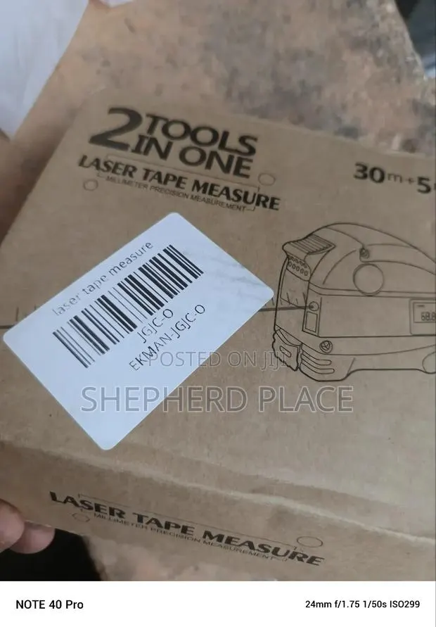 2-in-1 Laser Range Tape Measure · Photo 1
