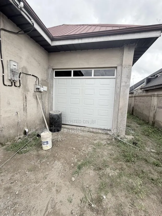 Canadian Black Automated Garage System · Photo 1