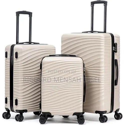 Size 28 3-Set Plastic Traveling Luggage · Photo 1