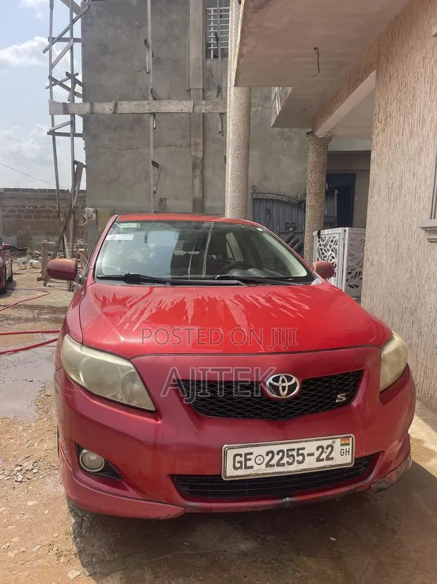 Toyota Corolla 2010 Red · Photo 1