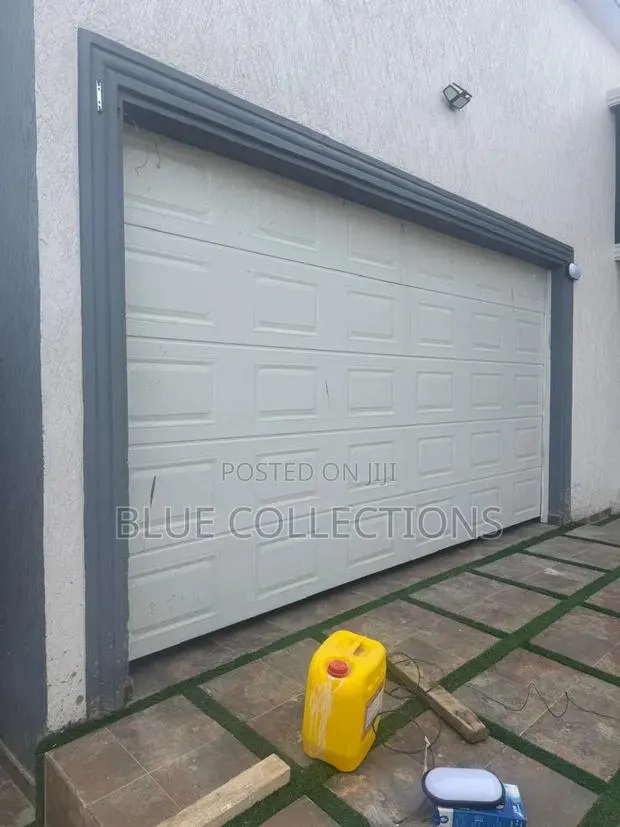 Smart Garage Doors With Remote Opener · Photo 1