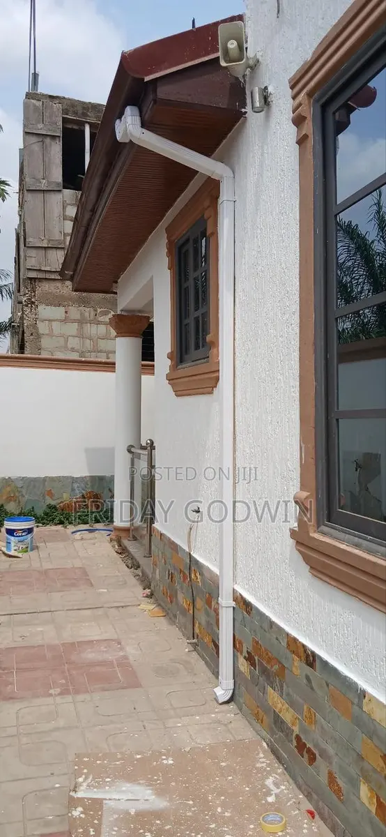 Installation of PVC and Downspout · Photo 1