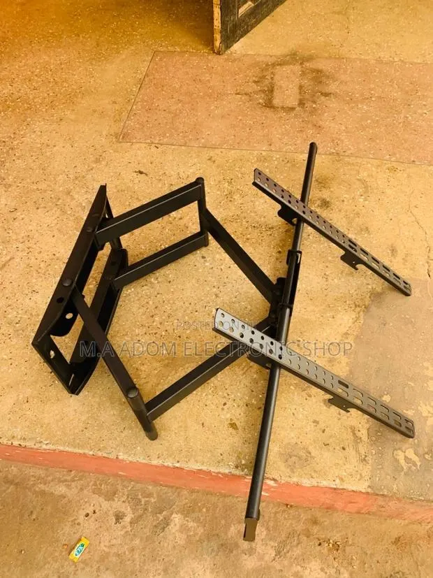 Transform Your Viewing Experience: Adjustable TV Mount · Photo 1