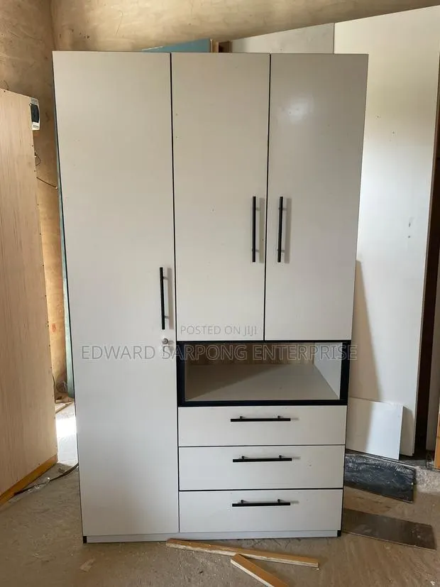 Modern 3 Door White Wardrobe With Drawers and Open Shelf Storage · Photo 1