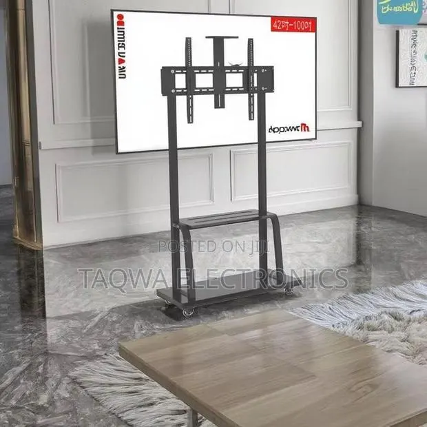 Typically _Mobile Universal_ Tv Stand 32-75 Inches · Photo 1