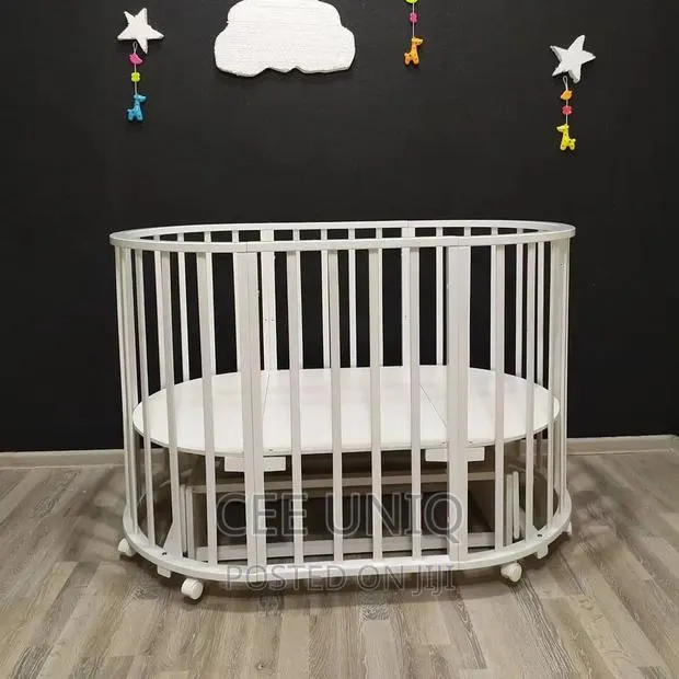 Multifunctional Baby Crib or Cot · Photo 1