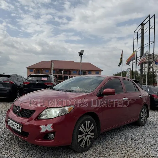 Toyota Corolla LE 4dr Sedan (1.8L 4cyl 4A) 2010 Red · Photo 1