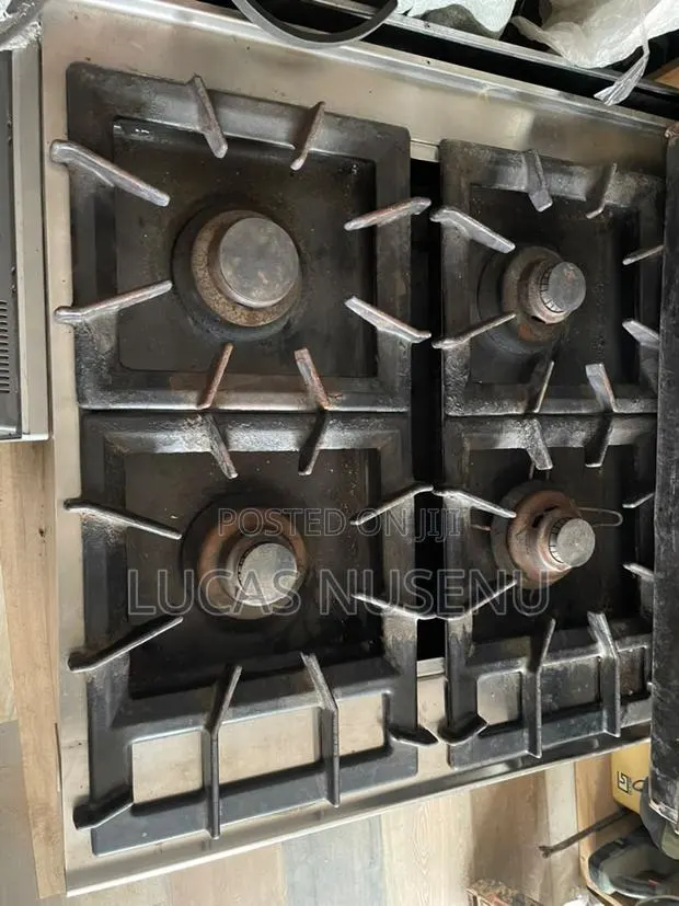 Commercial Stainless Steel Gas Range With Oven Storage · Photo 3