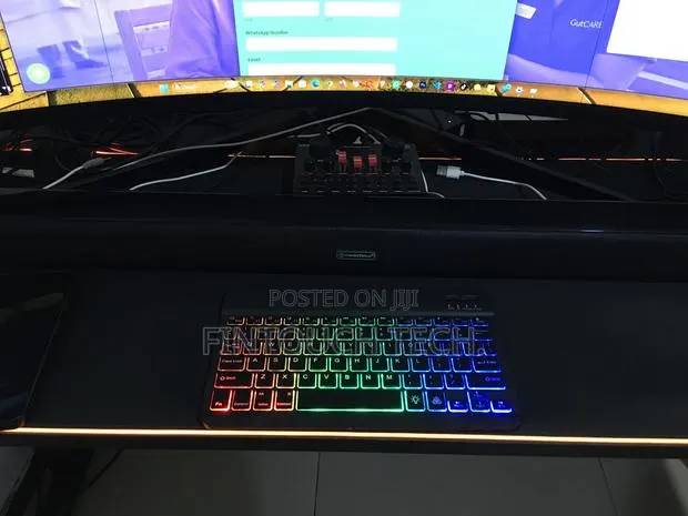 Ultra Slim Wireless Rechargeable Keyboard With RGB Light and Mouse · Photo 1