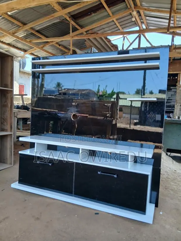 Television Units With Doors and Shelves · Photo 1