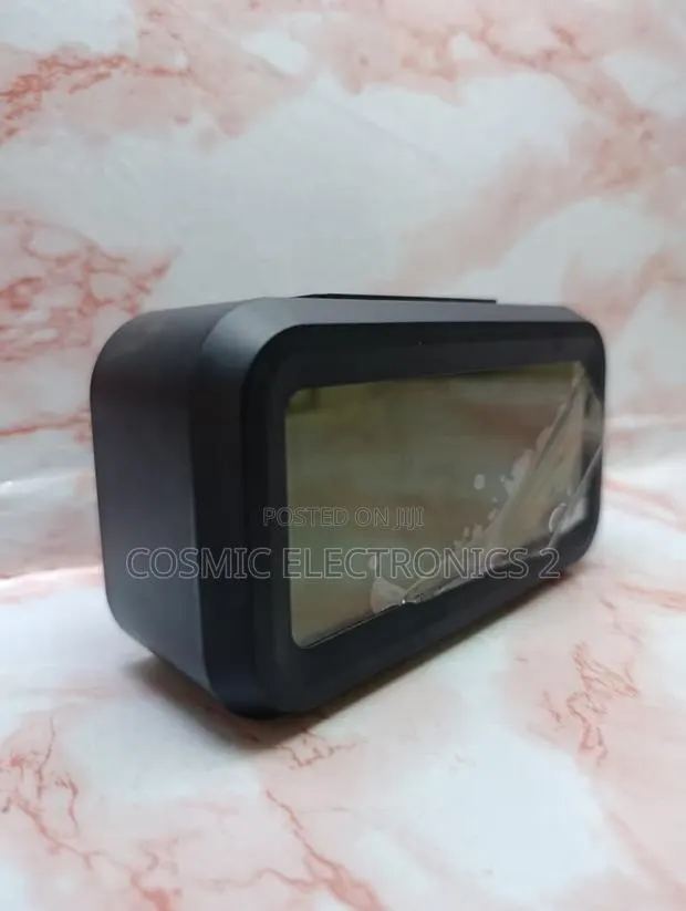 Optically Controlled Digital Alarm Clock With Temperature Display · Photo 1