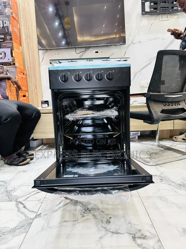 Brand New Sleek Black Midea Gas Cooker Oven 4b 50/50 · Photo 1