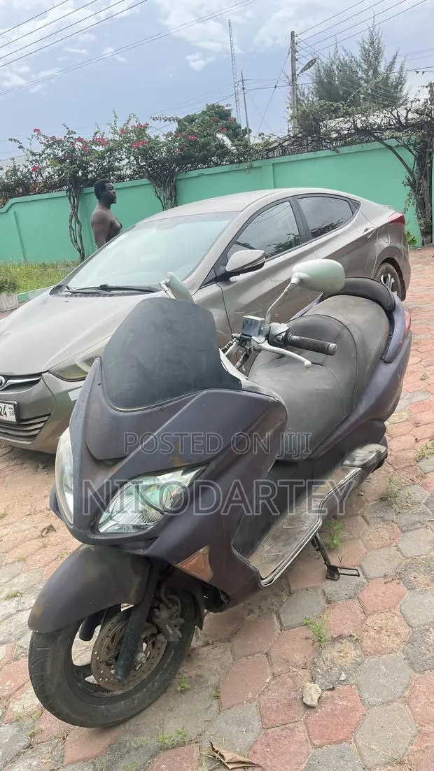 Honda Forza 2011 Brown · Photo 1