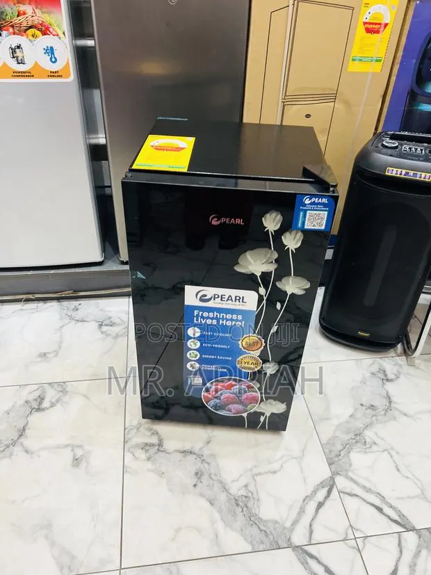 Extremely Quality Pearl Pf-109-2b Single Door Table Top Fridge(Black). · Photo 1