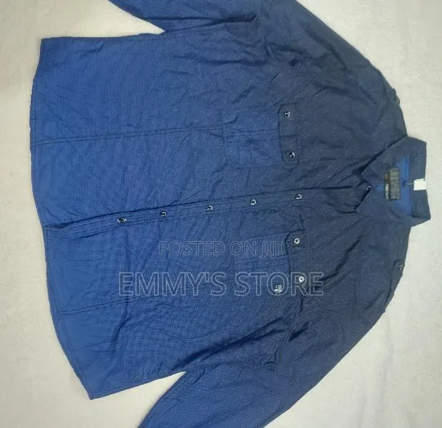 T-Shirts, Lacos, Jeans Tops, Singlets, Trousers · Photo 1