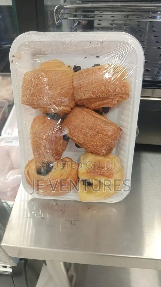 Croissant, Spring Rolls,Small Chops · Photo 1