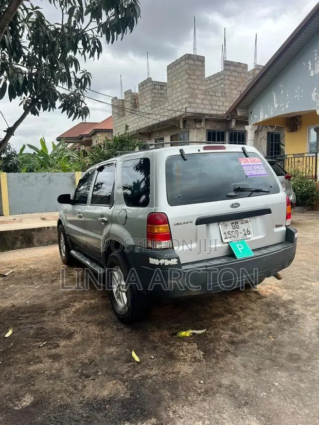 Ford Escape XLS 2006 Silver · Photo 1