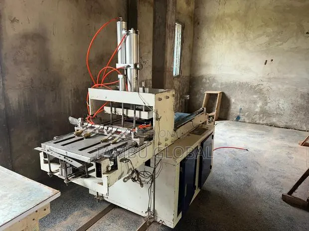 Automatic Plastic Bag Handle-Punching Stacking Machine — Tamale · Photo 3