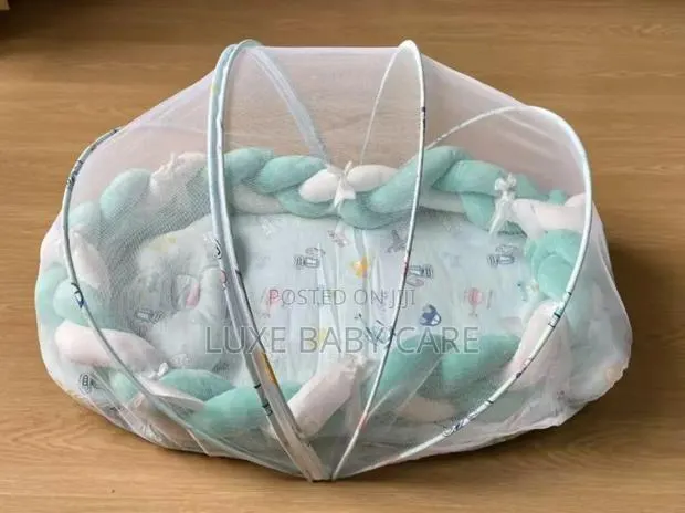 Baby Bed With a Mosquito Net and a Braided Bumper Guard. · Photo 1