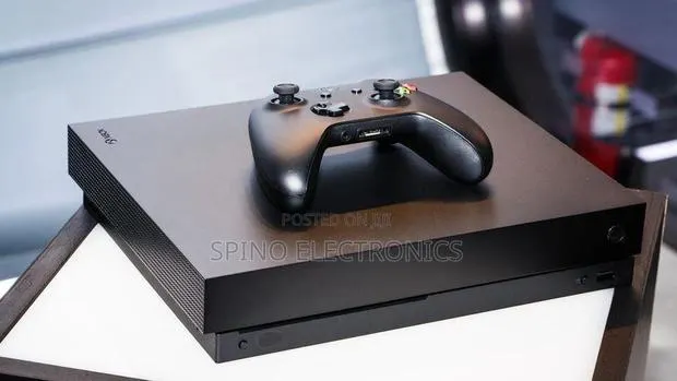 Xbox One X With 20 Games · Photo 1