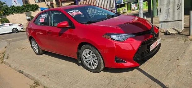 Toyota Corolla LE 4dr Sedan (1.8L 4cyl CVT) 2017 Red · Photo 1