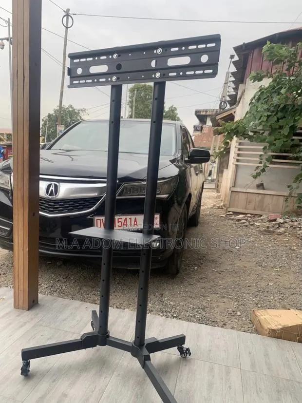 Purchase Authentic Mobile Tv Stand With Wheels for 32”-70”. · Photo 1