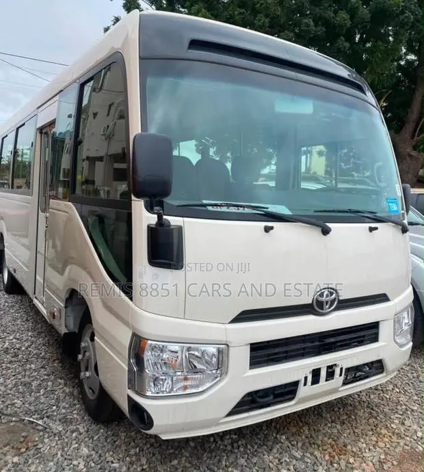 New Toyota Coaster 2025 White · Photo 1
